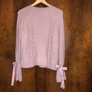 Embossed lavender cozy sweater with silver threading accent. Excellent condition